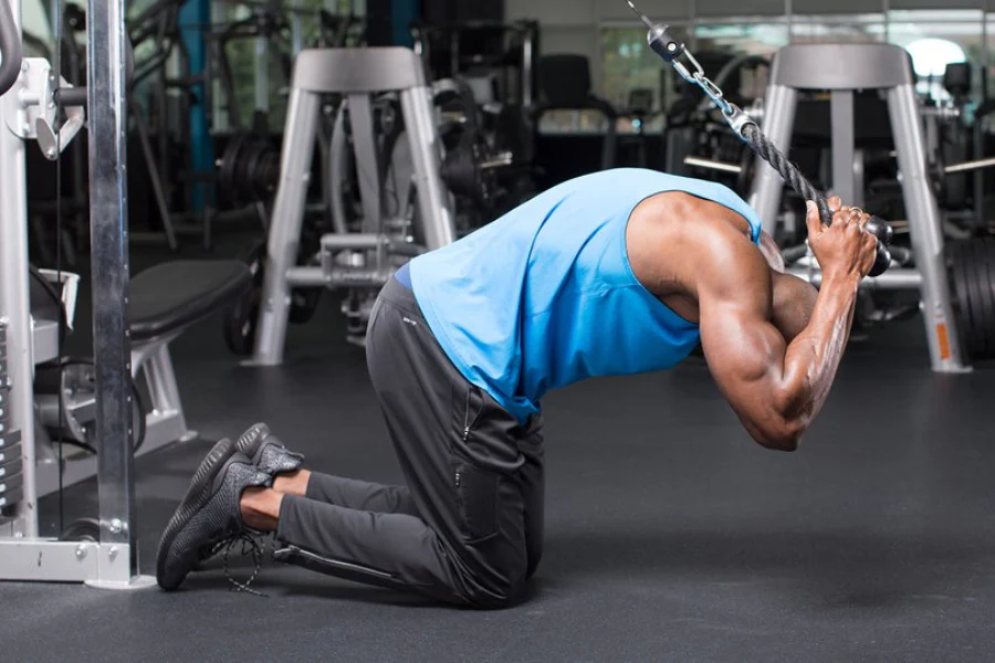 Man doing cable crunches