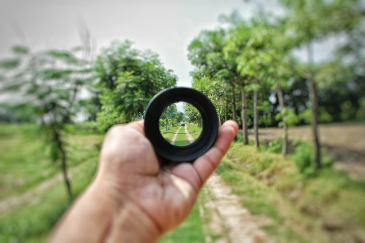 Man focus with a lense eye