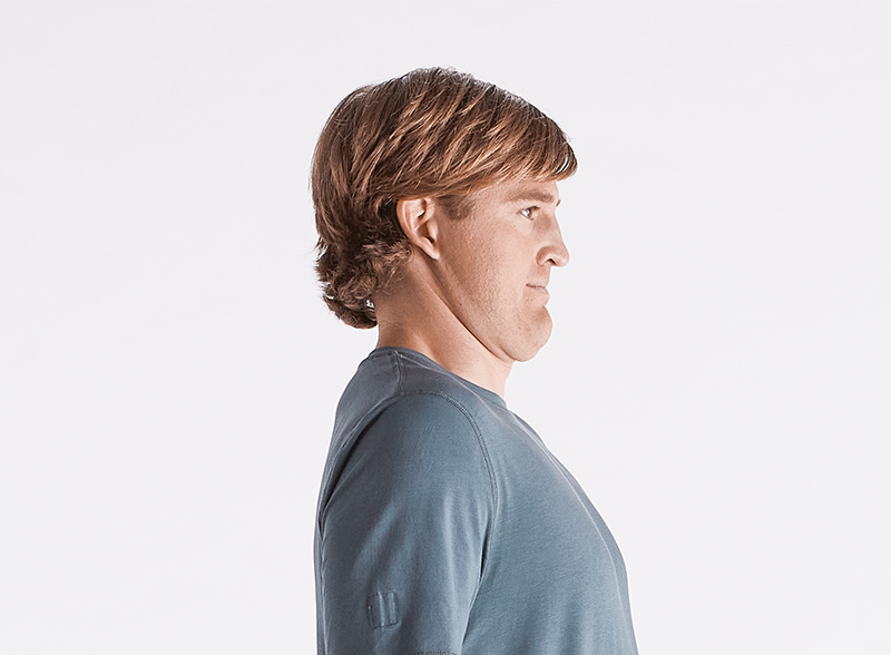 man doing chin tuck straight back