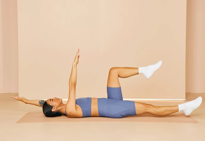 Girl doing dead bug exercise